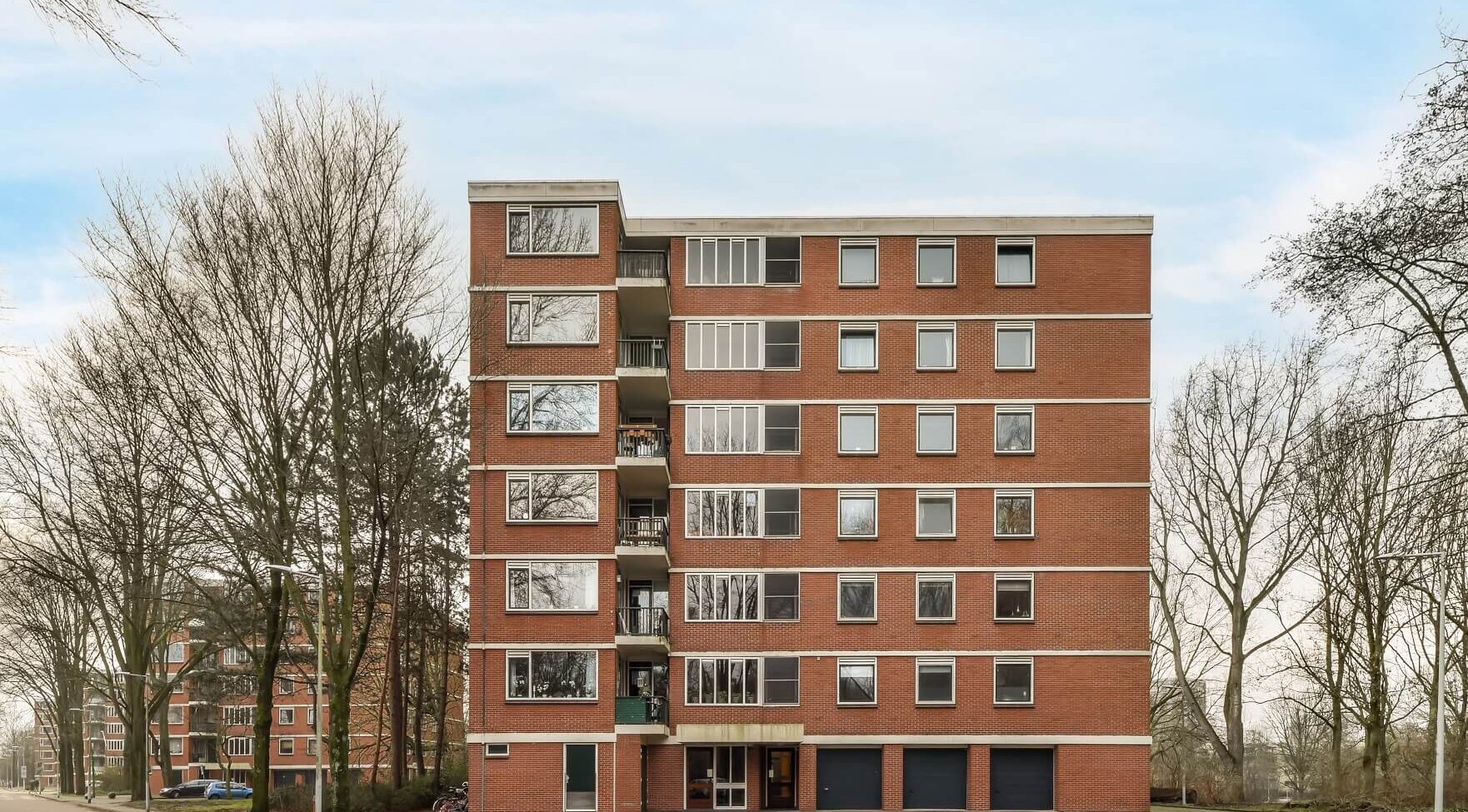 How to Make Money in Real Estate Passively a multi storey brick building 2022 04 05 04 19 33 utc.jpg